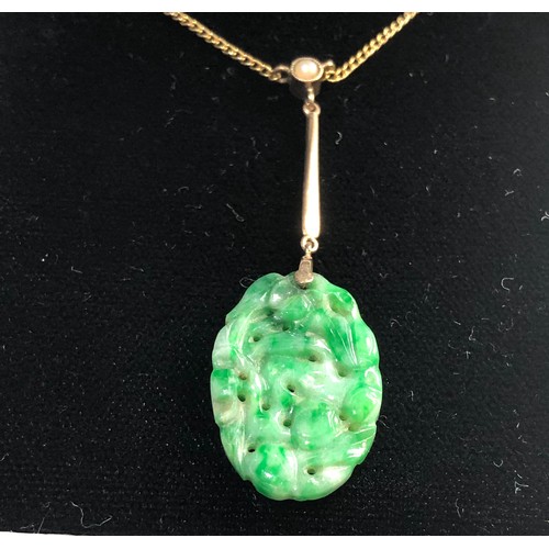 307 - 9ct gold carved jade & pearl pendant and chain, approximate total weight 3.7g, item is in good overa... 