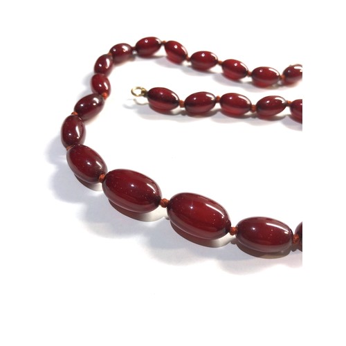 312 - Cherry amber / bakelite necklace 18.6g good internal streaking