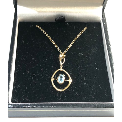 210 - small 9ct gold gem set pendant and chain