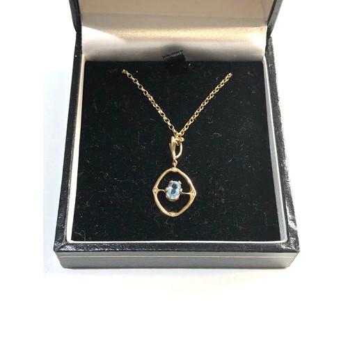 210 - small 9ct gold gem set pendant and chain