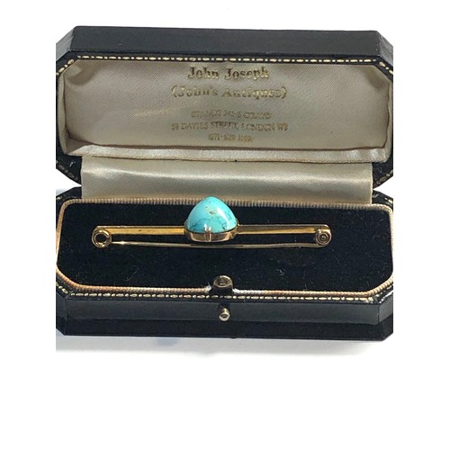 128 - 9ct gold turquoise bar brooch