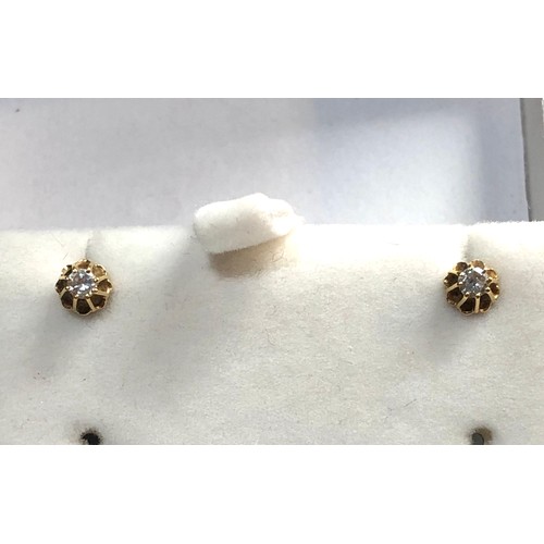 125 - 18ct gold diamond stud earrings