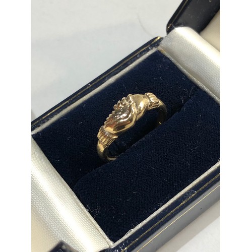 175 - 9ct Gold holding hands ring, weight approx 2.4g