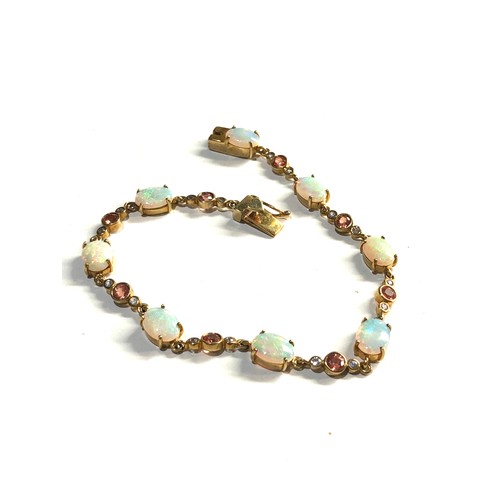 209 - 9ct Gold and opal bracelet, overall good condition, approximate weight: 9.1g, approximate length: 20... 