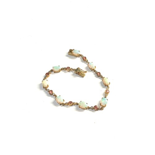 209 - 9ct Gold and opal bracelet, overall good condition, approximate weight: 9.1g, approximate length: 20... 