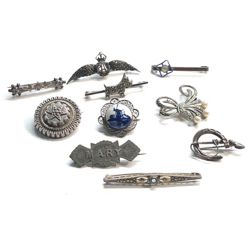 342 - Selection of vintage silver brooches