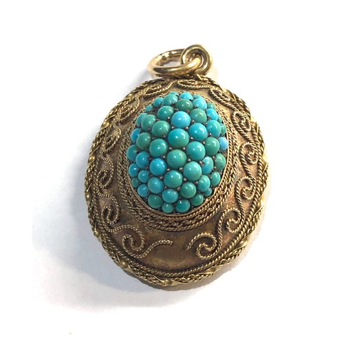 183 - Antique high carat  gold and turquoise pendant locket 1 small stone missing measures approx 31mm by ... 