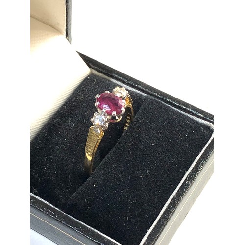 244 - 18ct gold diamond & ruby ring, ring size approx q/r, overall condition central stone measures approx... 