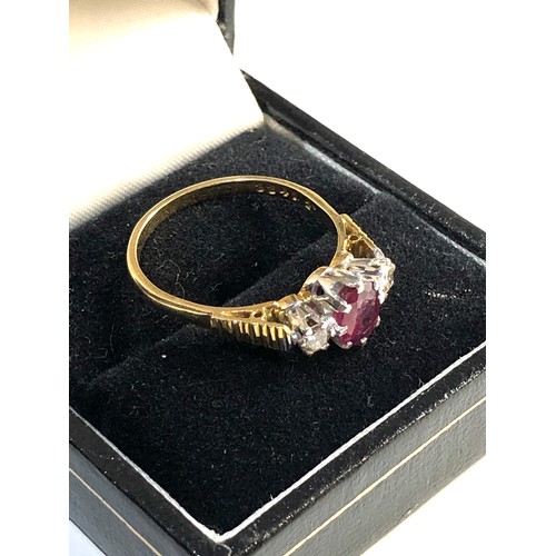 244 - 18ct gold diamond & ruby ring, ring size approx q/r, overall condition central stone measures approx... 