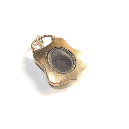 82 - 9ct gold agate morning padlock locket pendant, this piece is in good overall condition