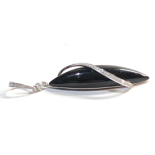 162 - 18ct Onyx & diamond pendant