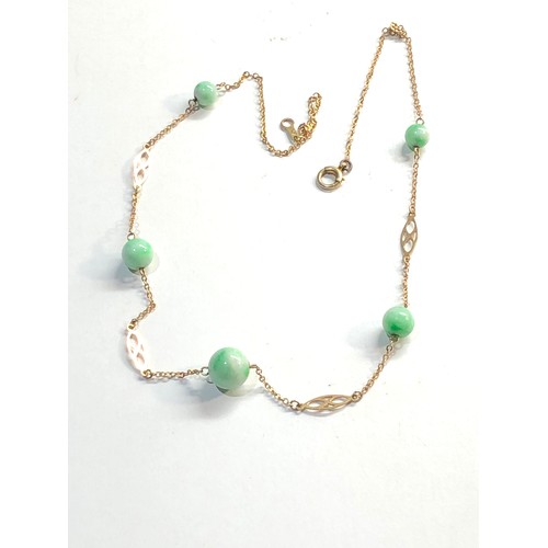 36 - 9ct gold jade necklace, overall good condition, largest jade bead measures approximately 9mm