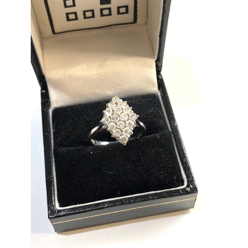 292 - 18ct white gold diamond cluster ring,  ring size approx n