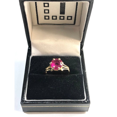 237 - 18ct gold gemstone ring, ring size approx L