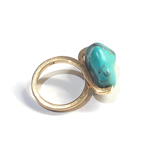 254 - 18ct gold turquoise spinning ring, approximate ring size K, approximate weight 7.4g, this piece is i... 