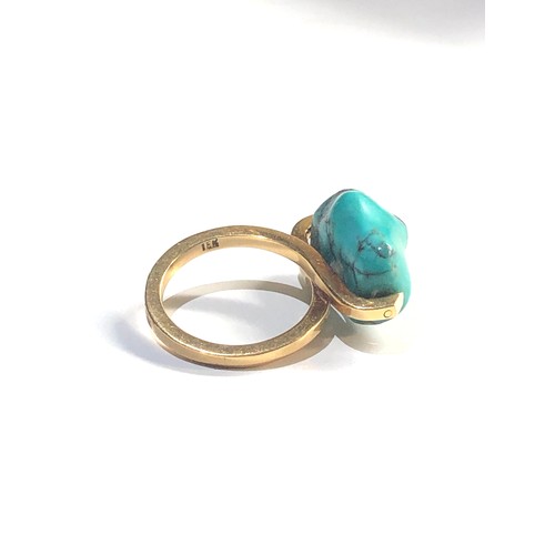 254 - 18ct gold turquoise spinning ring, approximate ring size K, approximate weight 7.4g, this piece is i... 