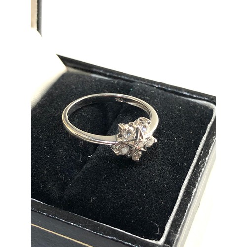 122 - 18ct gold diamond star ring