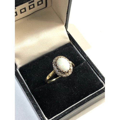 241 - 18ct Gold opal diamond ring, Good overall condition, no stones missing Weight approx 4.3g size appro... 