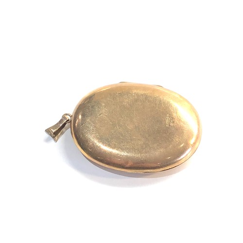 132 - large 9ct gold etched locket