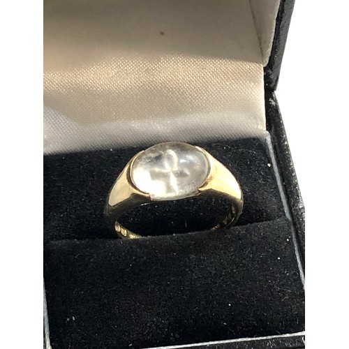 310 - 9ct Gold carved rock crystal ankh ring,  ring size approx s, good overall condition, ring is slightl... 