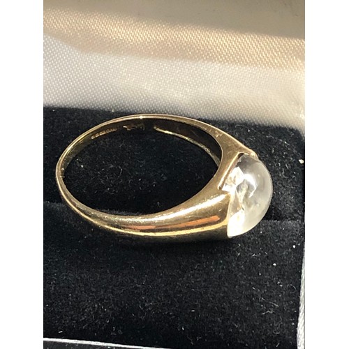 310 - 9ct Gold carved rock crystal ankh ring,  ring size approx s, good overall condition, ring is slightl... 