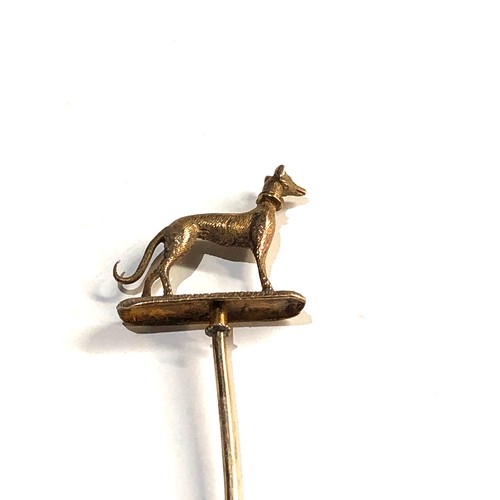 20 - high carat  Gold greyhound stick pin measures approx 9.5cm long, his piece is in good overall condit... 