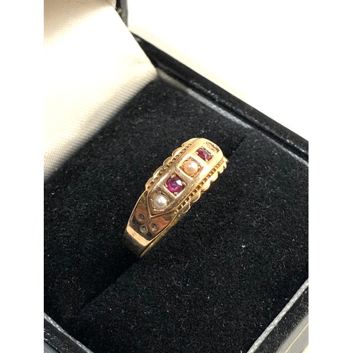 159 - 15ct gold ruby and seed pearl ring size approx m/n weight approx 2.1g, Good overall condition, no st... 