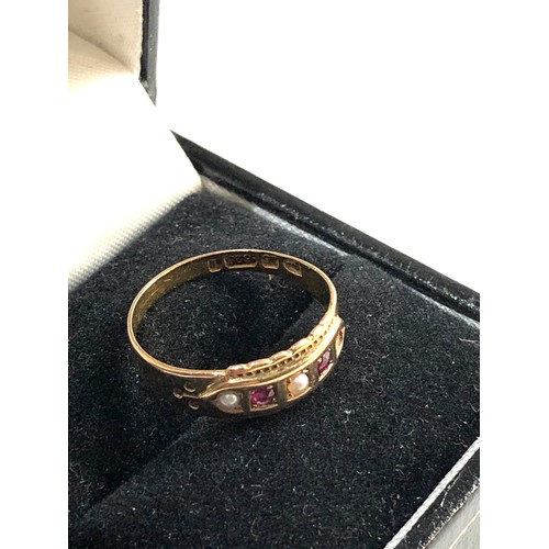 159 - 15ct gold ruby and seed pearl ring size approx m/n weight approx 2.1g, Good overall condition, no st... 