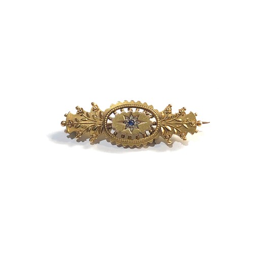 294 - 15ct gold diamond and sapphire brooch