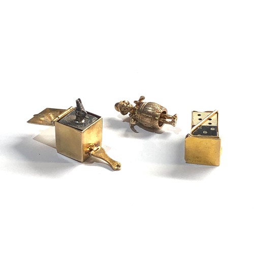 38 - 3 vintage 9ct gold charms includes rare jack in the box charm, these piece's are in good overall con... 