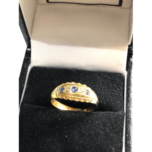 288 - 18ct gold diamond and sapphire gypsy ring,  ring size approx m