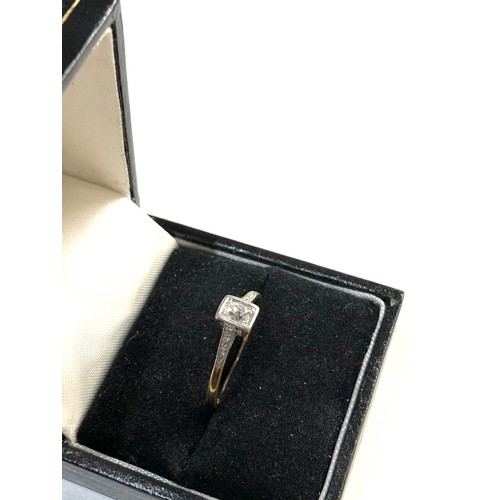 246 - 18ct gold diamond solitaire ring ring size approx p,  this ring is missing a small diamond