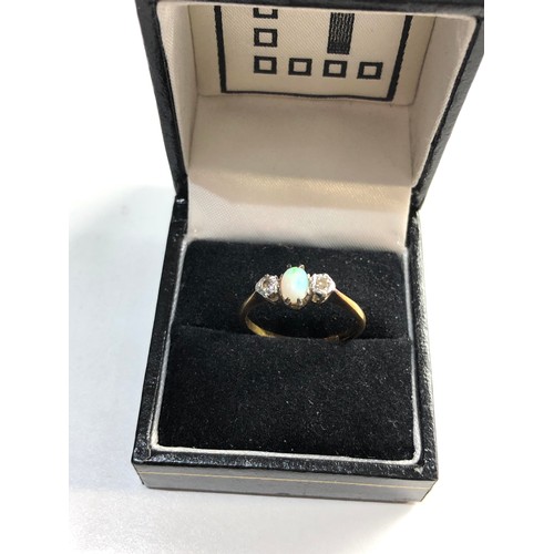 211 - 18ct Gold opal diamond ring, ring size approx q weight approx 3g, overall good condition, central op... 