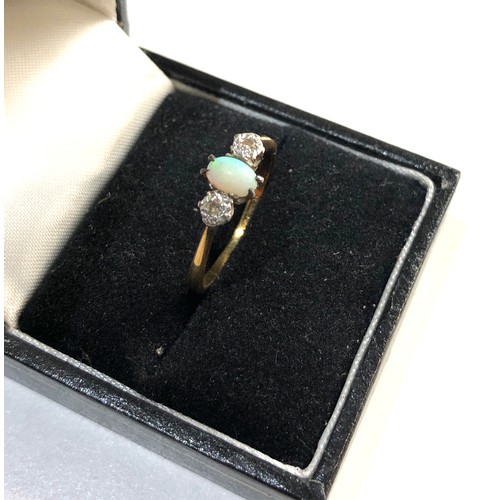 211 - 18ct Gold opal diamond ring, ring size approx q weight approx 3g, overall good condition, central op... 