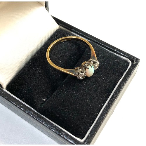 211 - 18ct Gold opal diamond ring, ring size approx q weight approx 3g, overall good condition, central op... 