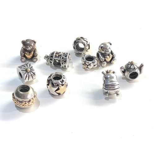 357 - 10 silver  pandora charms some are silver and gold