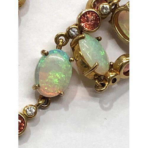 209 - 9ct Gold and opal bracelet, overall good condition, approximate weight: 9.1g, approximate length: 20... 