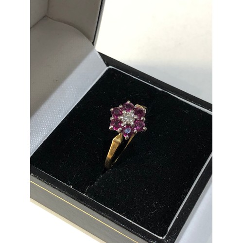 153 - 18ct gold diamond and ruby ring 2.7g