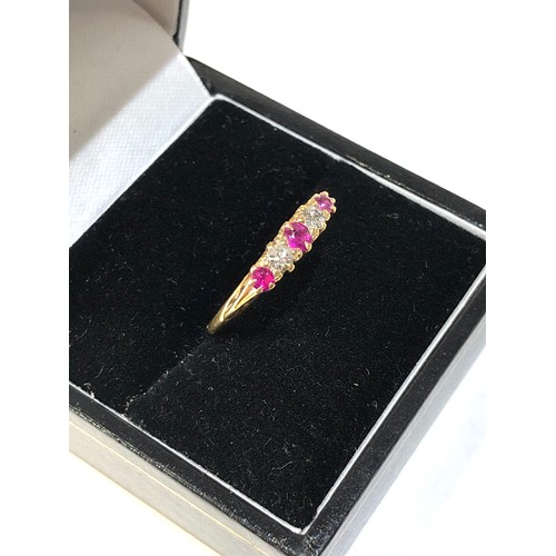 165 - 18ct gold diamond and ruby ring 2.3g