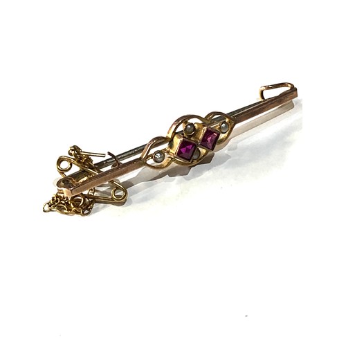 105 - 2 gold gem set bar brooches weight 4.5g