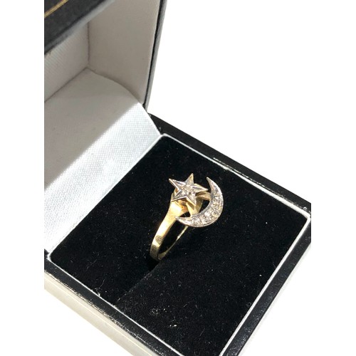 244 - 14ct gold diamond moon and star spinning ring weight 2g