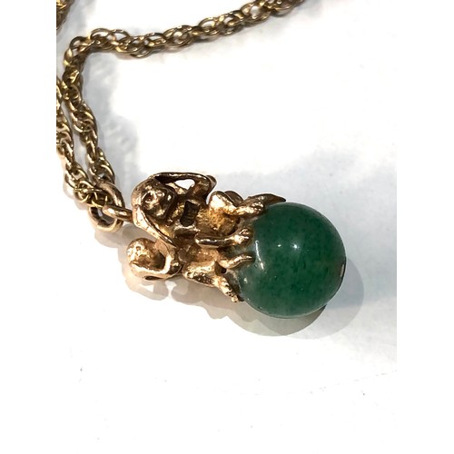 137 - 9ct gold monkey and jade pendant and necklace total weight 6.5g