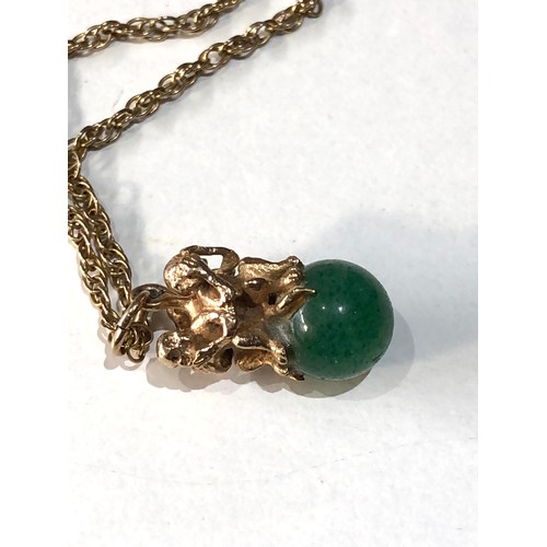 137 - 9ct gold monkey and jade pendant and necklace total weight 6.5g