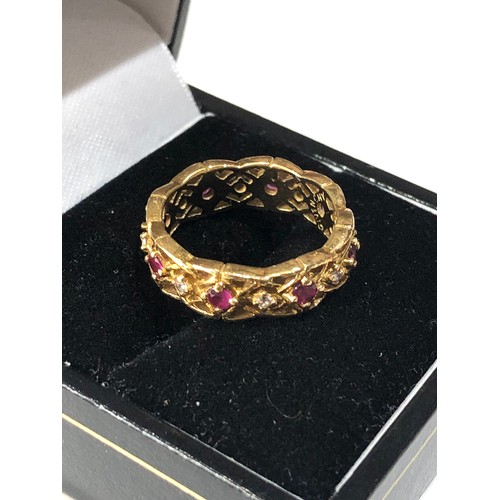 50 - Vintage diamond and ruby ring set all around with rubies and diamonds weight 6g