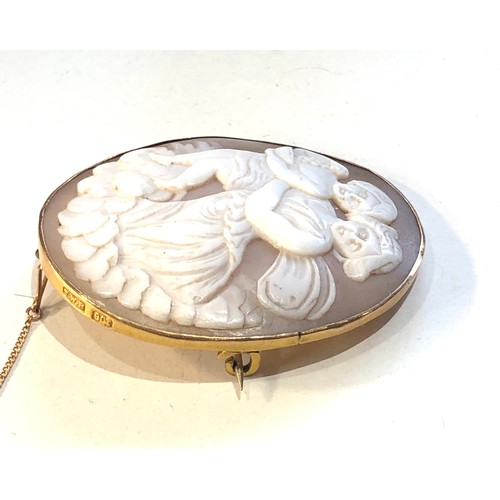 51 - 9ct gold cameo brooch measures approx 5cm by 4cm