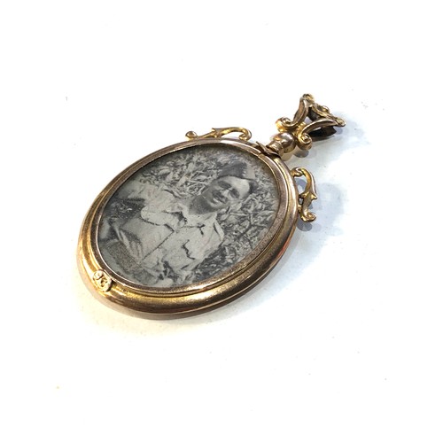 56 - Antique 9ct  gold picture pendant measures approx 4.8cm by 2.8cm widest points weight 4.2g