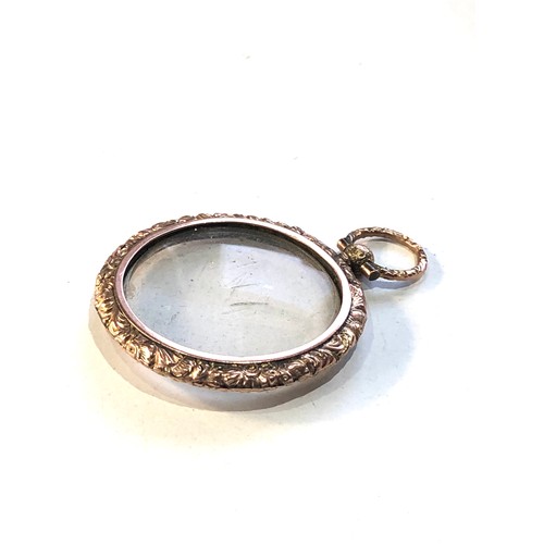 57 - Antique 9ct  gold picture pendant measures approx 4.6cm by 3.4cm widest points weight 7.1g