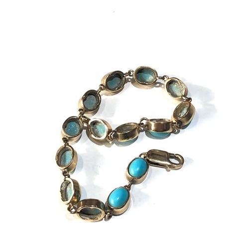 72 - 9ct gold turquoise stone set bracelet measures approx  20cm long 7mm wide weight 13.2g