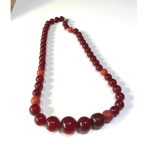 132 - Cherry amber bakelite round bead necklace 5 beads are not bakelite and are lighter colour some beads... 