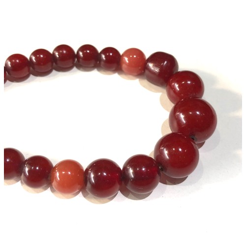 132 - Cherry amber bakelite round bead necklace 5 beads are not bakelite and are lighter colour some beads... 